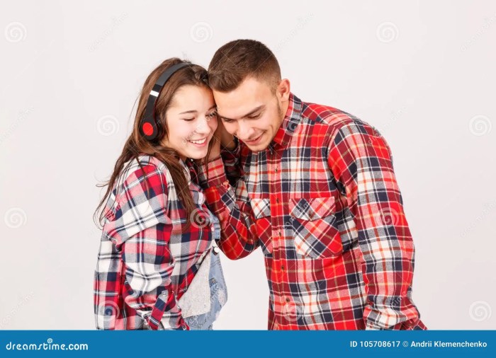 Listens headphones Listens headphones