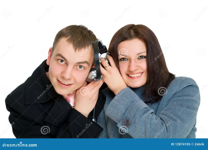 Listens headphones Listens headphones